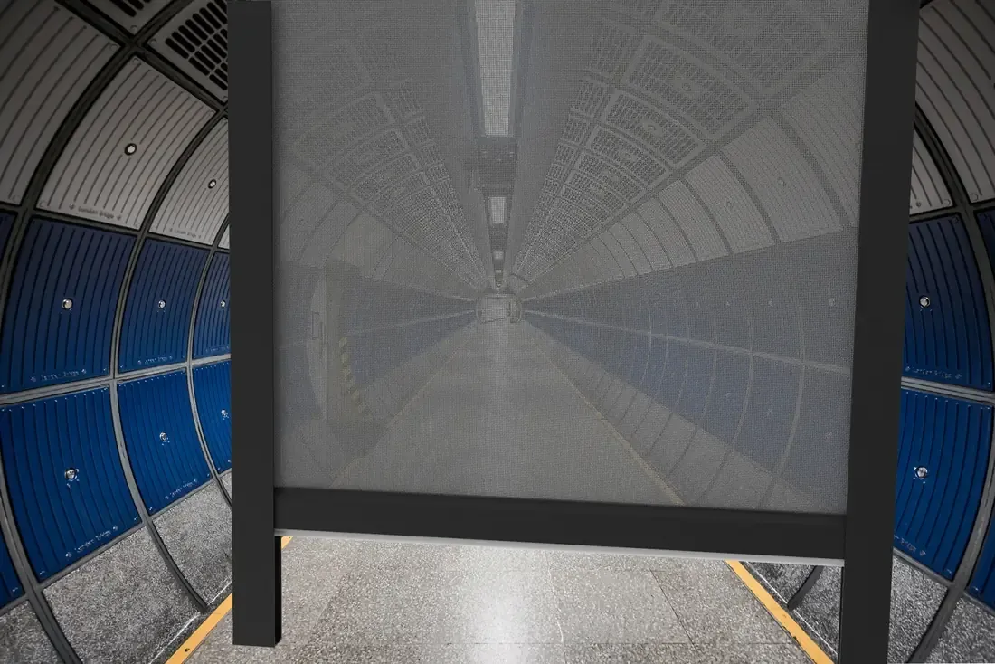 Animated image alternating between a windproof roller blind frame with no fabric and the same blind fitted with grey light-transmission fabric.