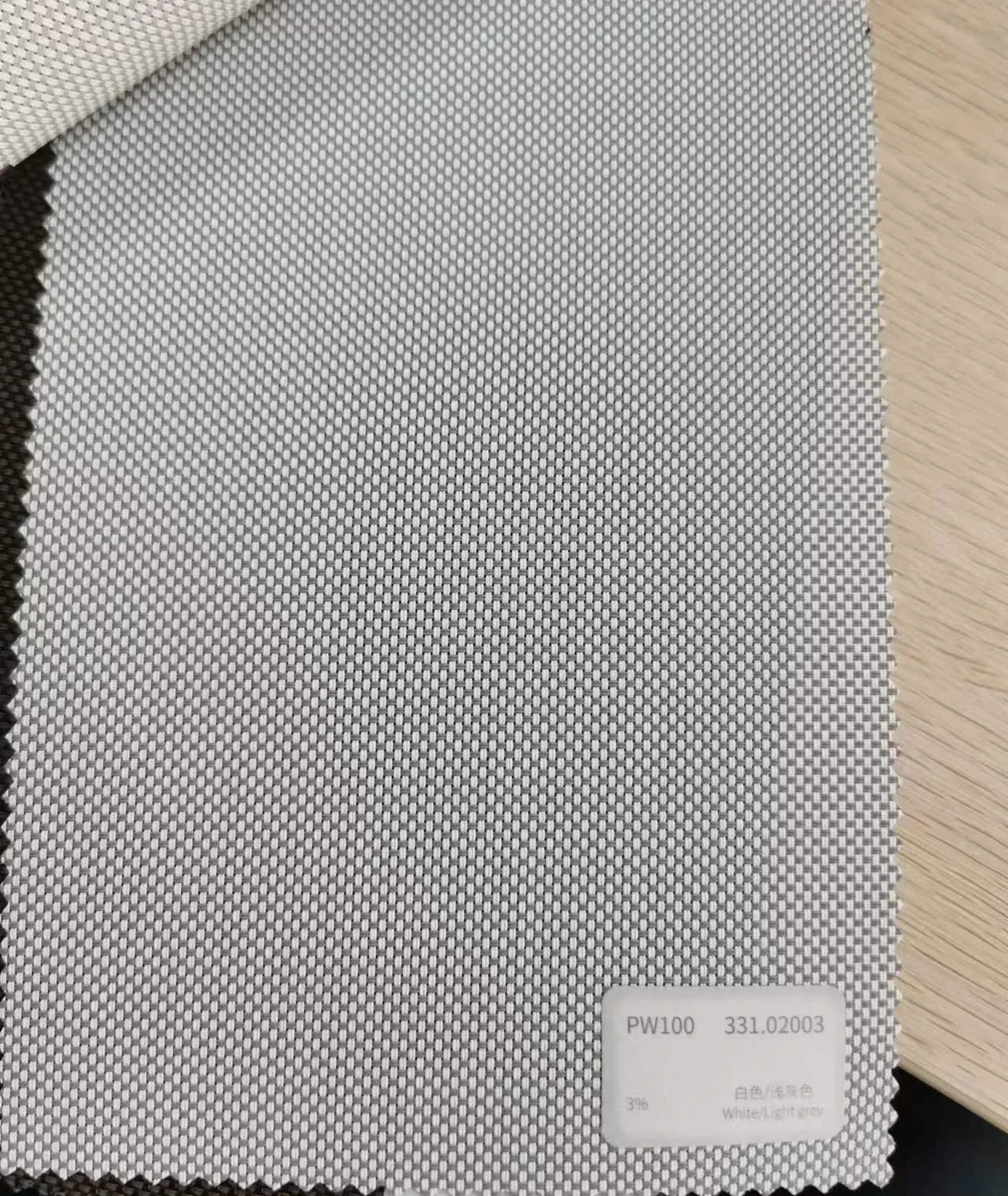 PW100 fabric colour swatch 331.02003 white and light grey, a 3% openness screen weave.