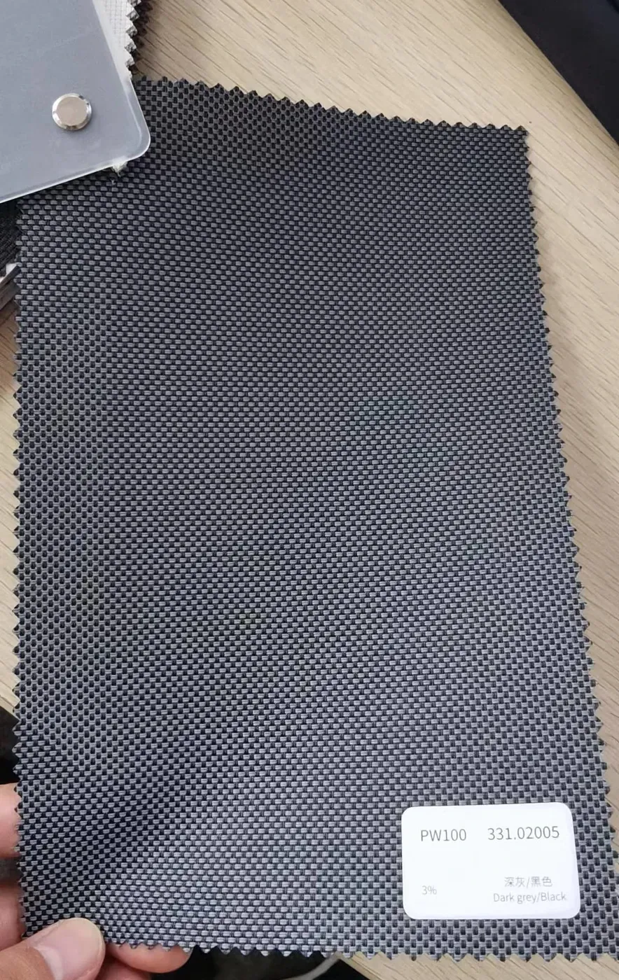 PW100 fabric colour swatch 331.02005 dark grey and black, a 3% openness screen weave.