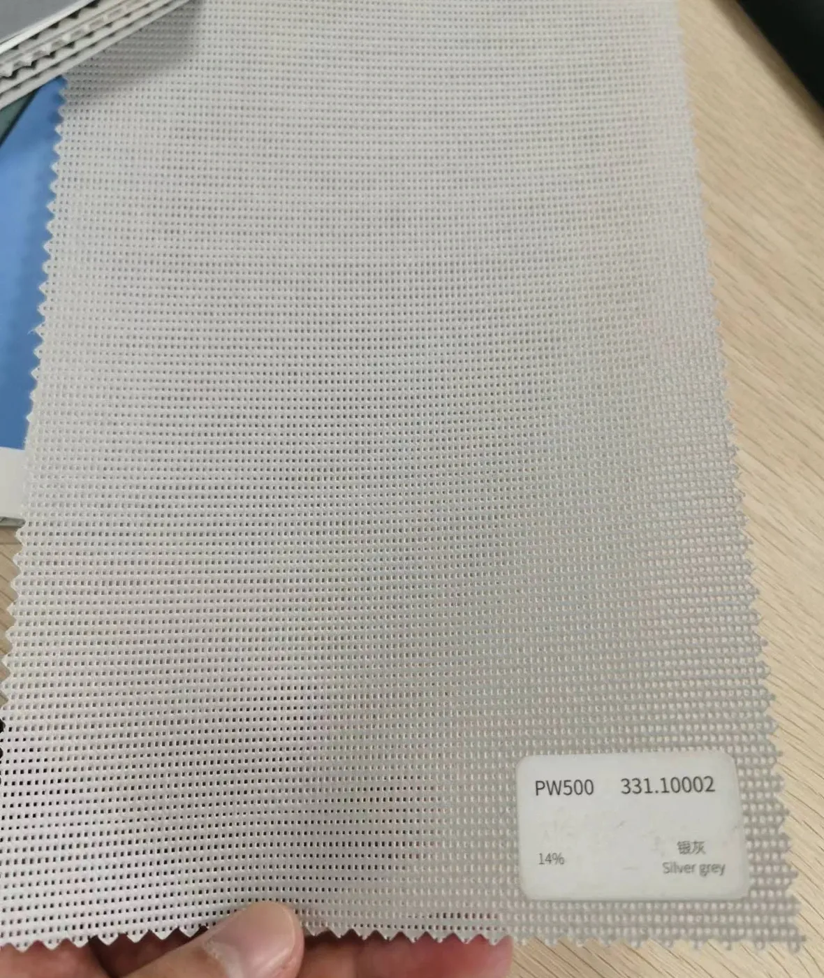 PW500 fabric colour swatch 331.10002 silver grey, a 14% openness screen weave.