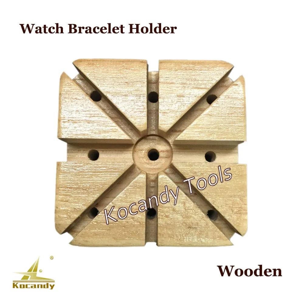 Wooden watch band holding blocks with cross slots and drill marks