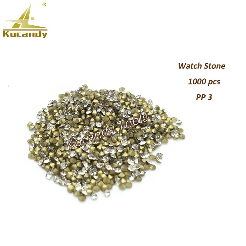 Heap of tiny gold and clear watch stones labelled PP3, 1000 pieces