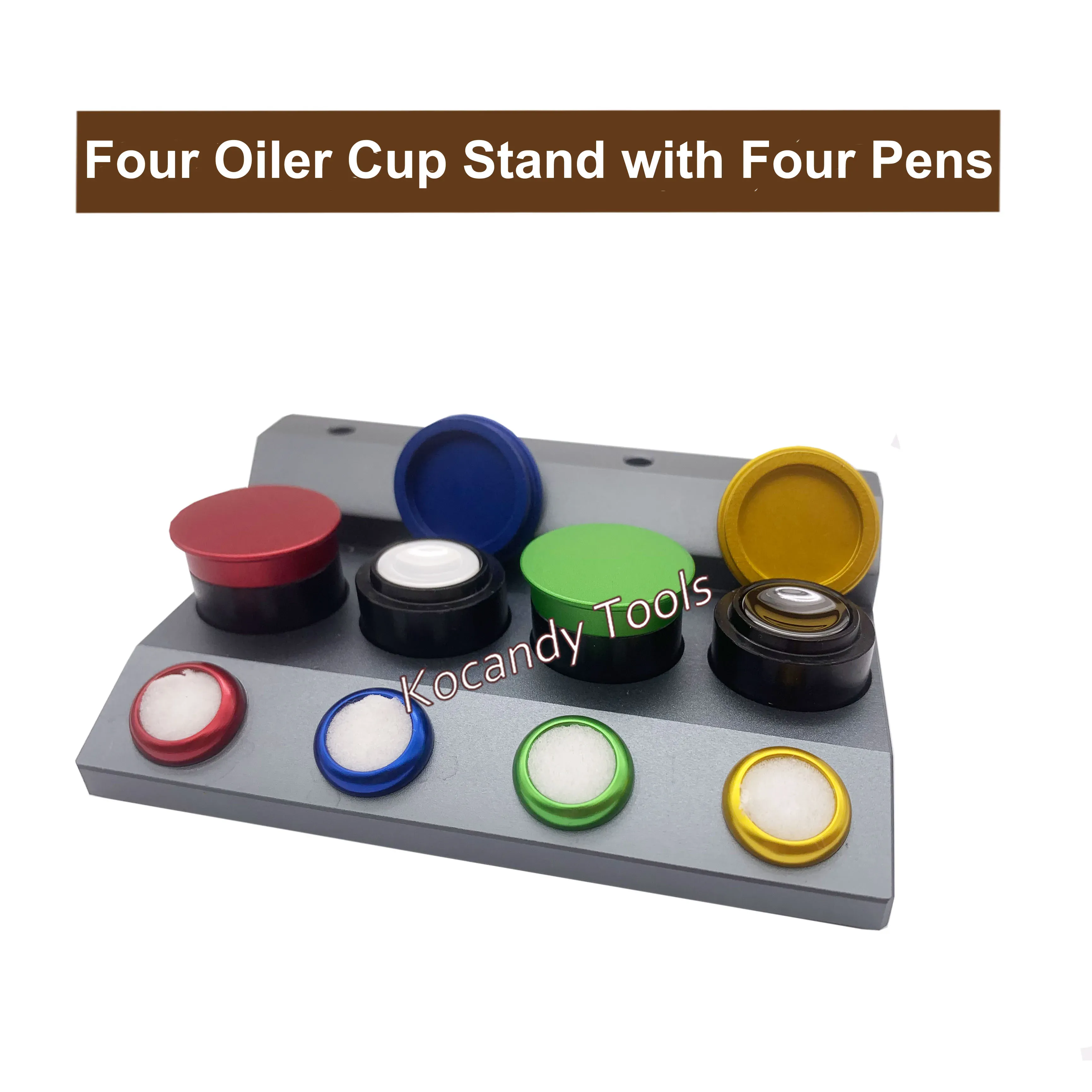Grey base plate with four coloured oil cups and a pen set