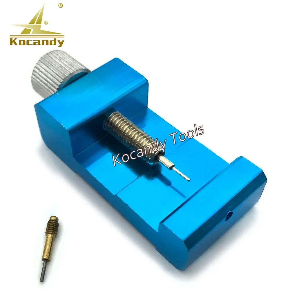 Blue alloy pin press in use pushing a pin through a band link