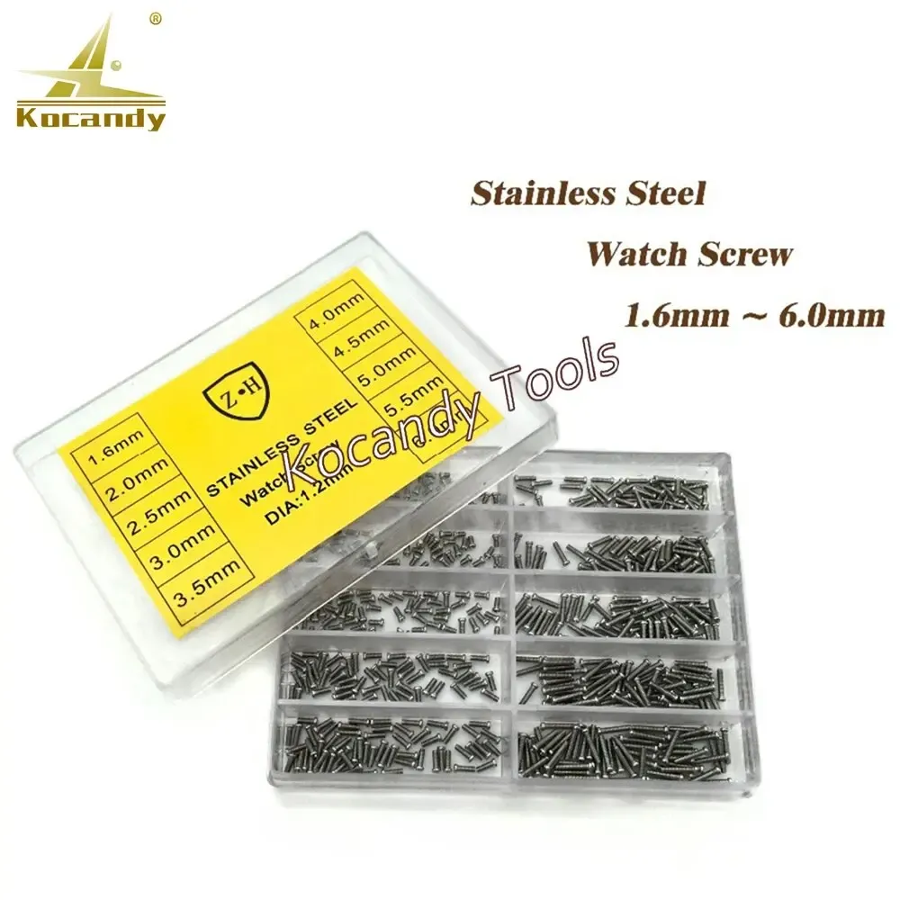 Compartment box of tiny watch screws beside a yellow label card
