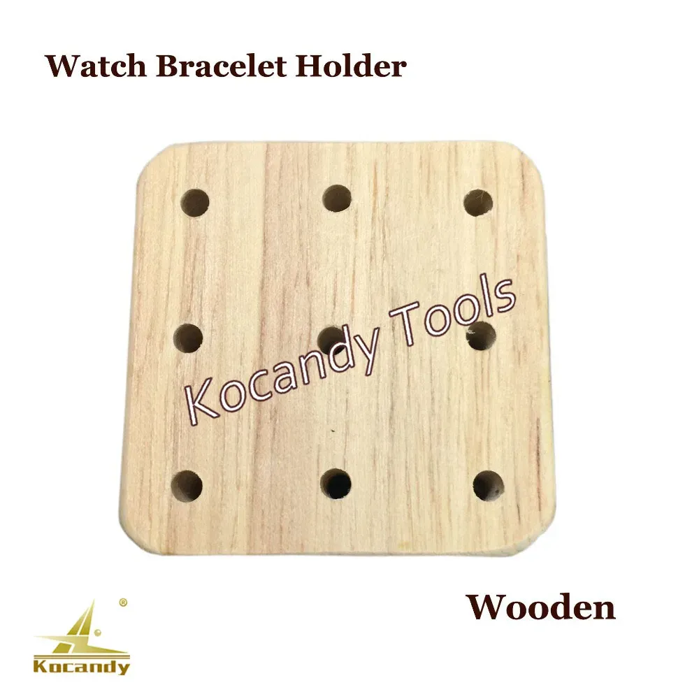 Face of the wooden block showing drilled holes and cross slots