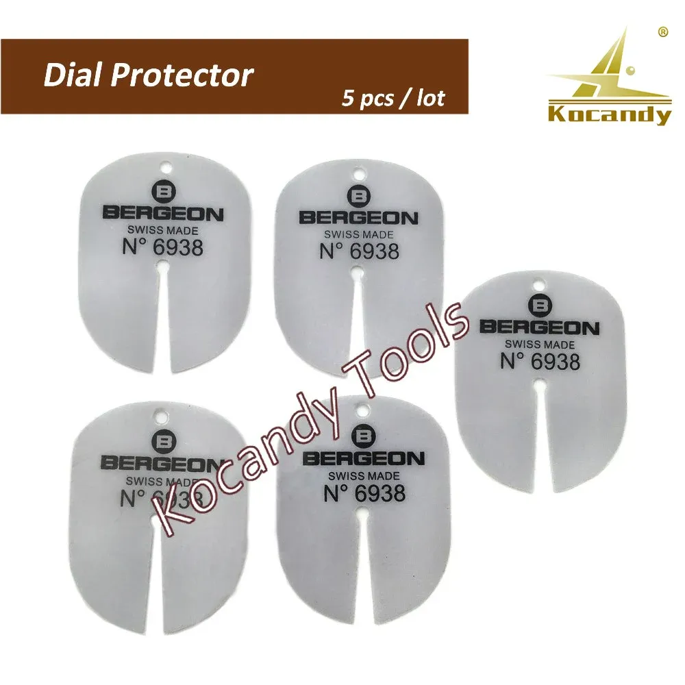 Five white Bergeon 6938 dial protector shims fanned out, for watch hand removal