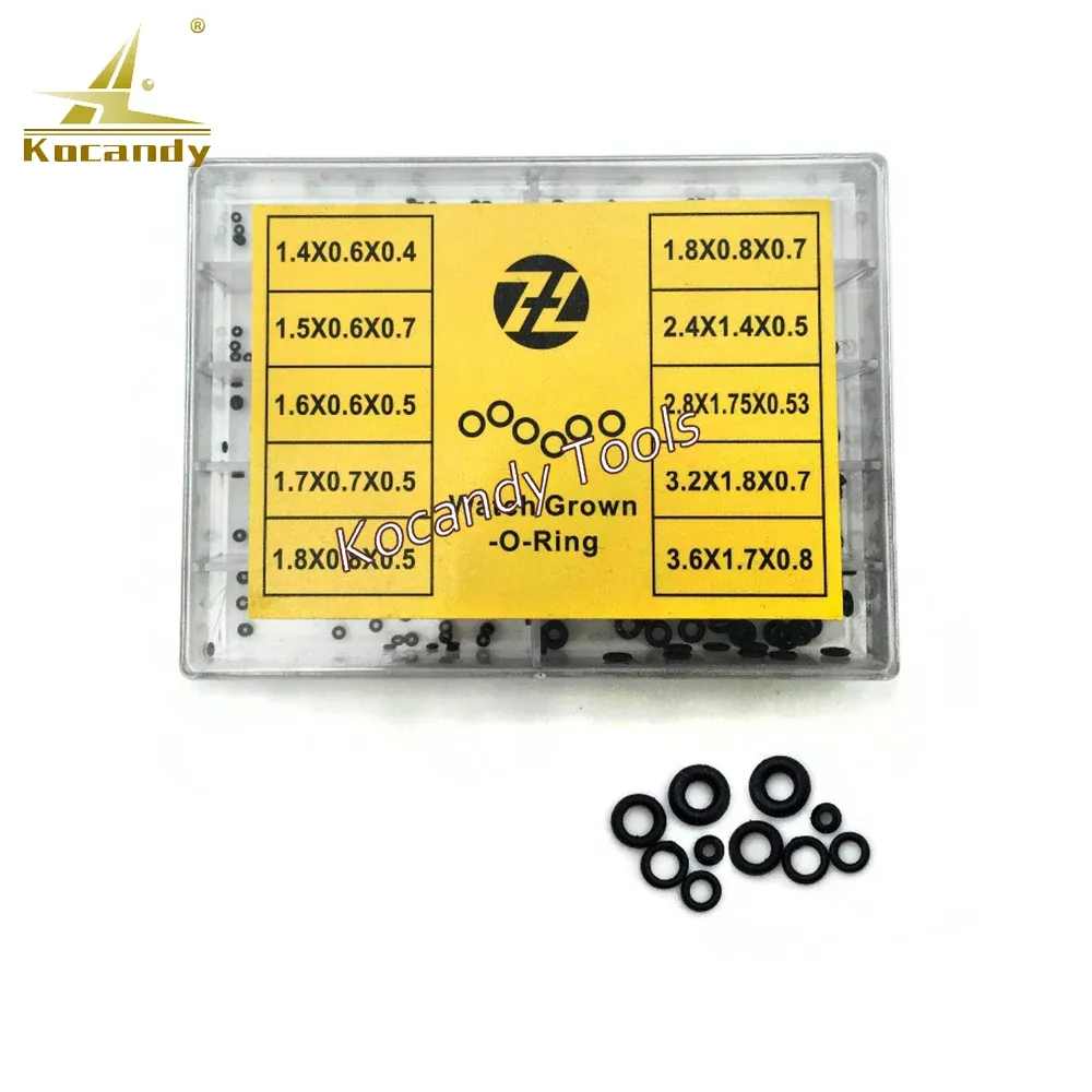 Clear compartment box of black crown O-rings with a yellow size card