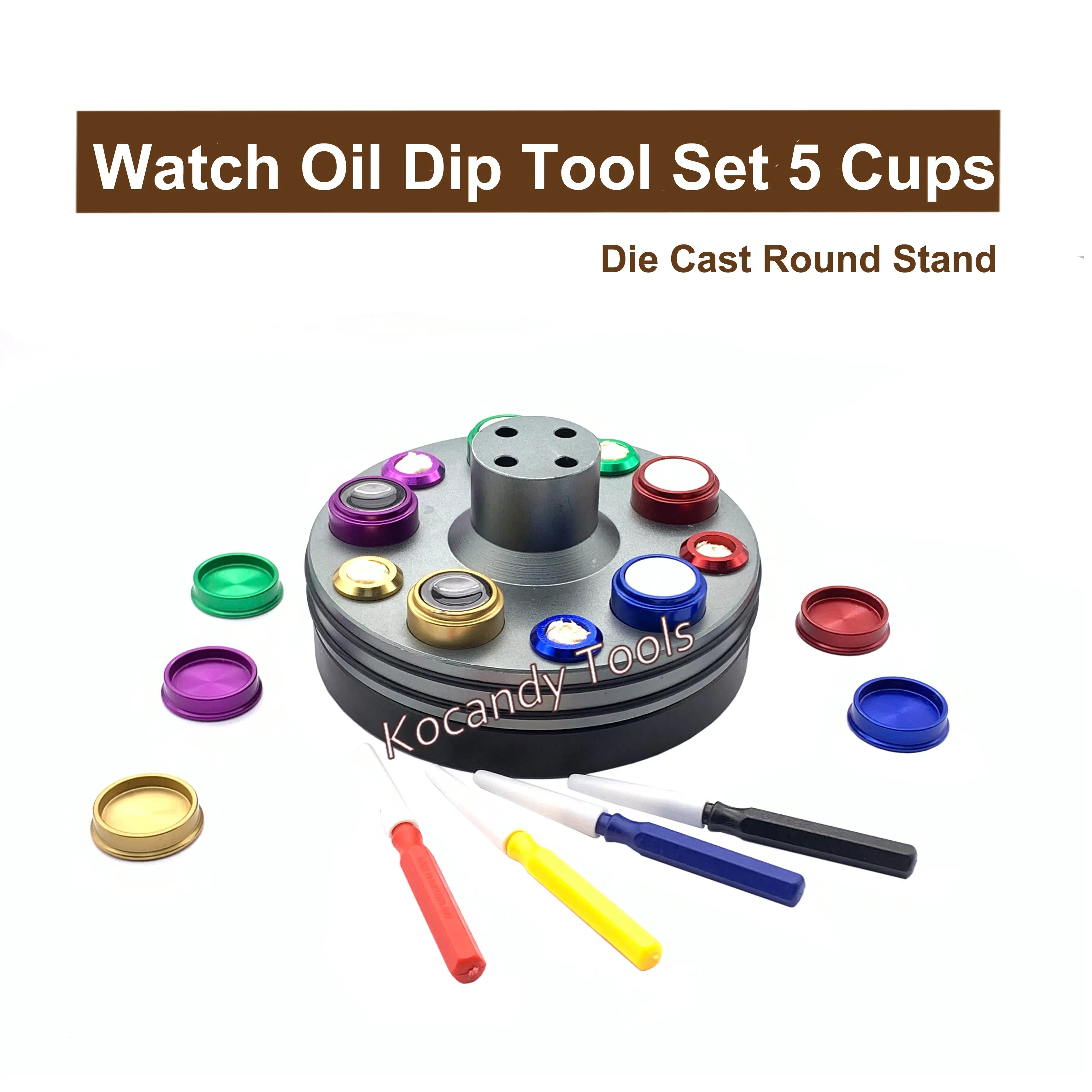 Oil cups with red, yellow and blue lids beside coloured pens