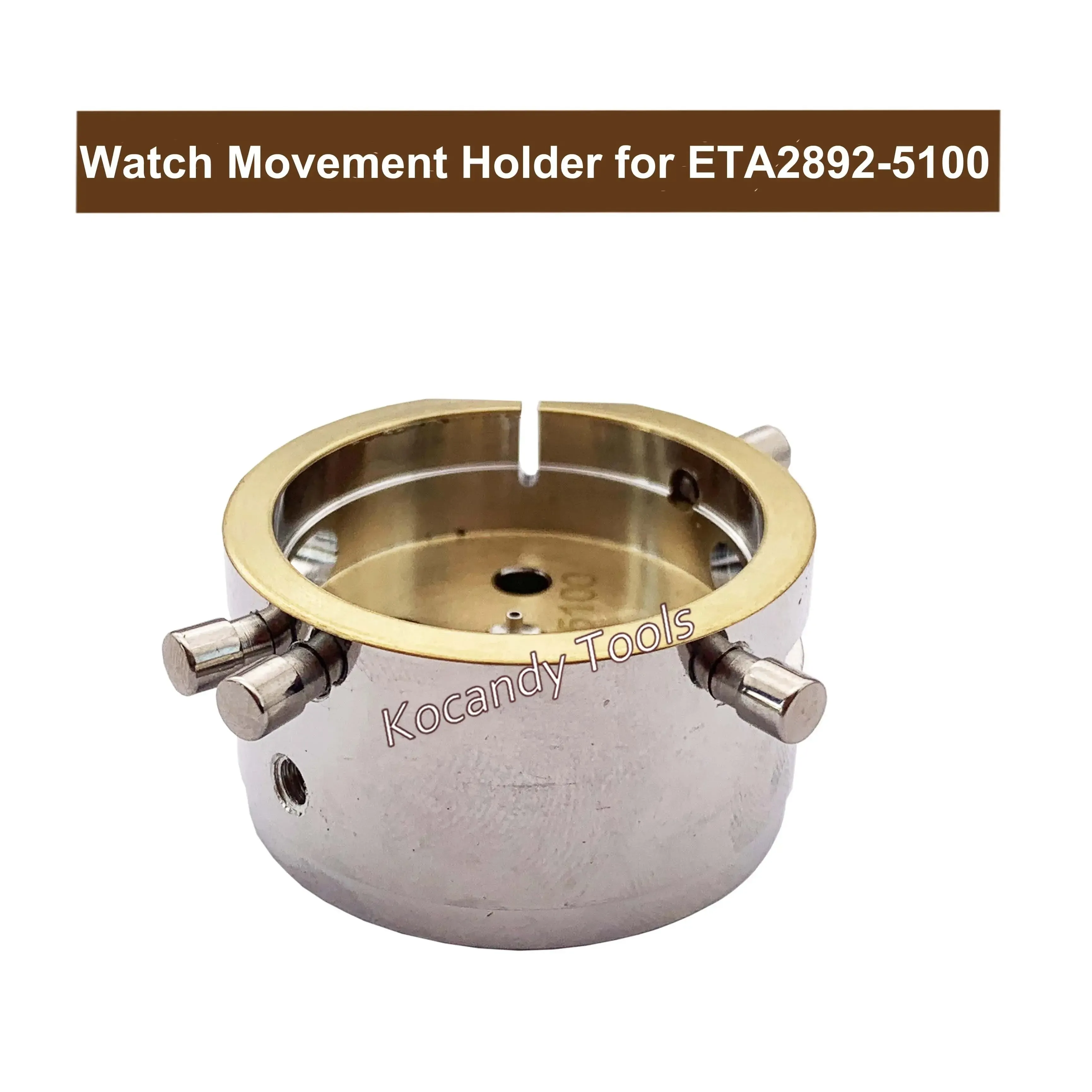 Grey movement holder with a brass centre insert fitted