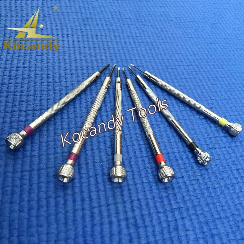 Six dual-head screwdrivers spread in a fan on blue, flat and Phillips tips