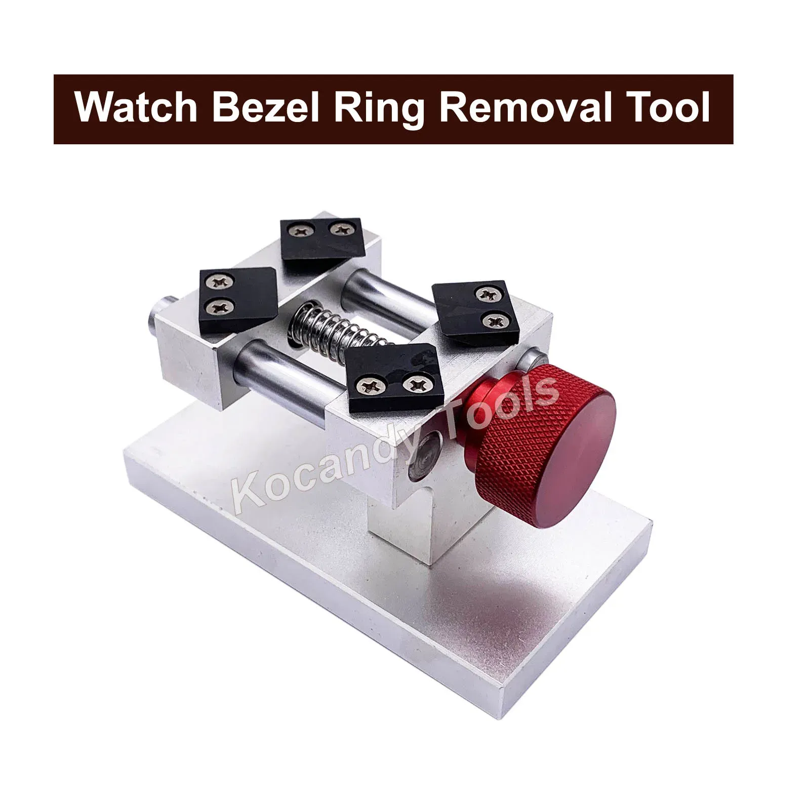 Steel bezel ring removal tool with a red knob on a metal base