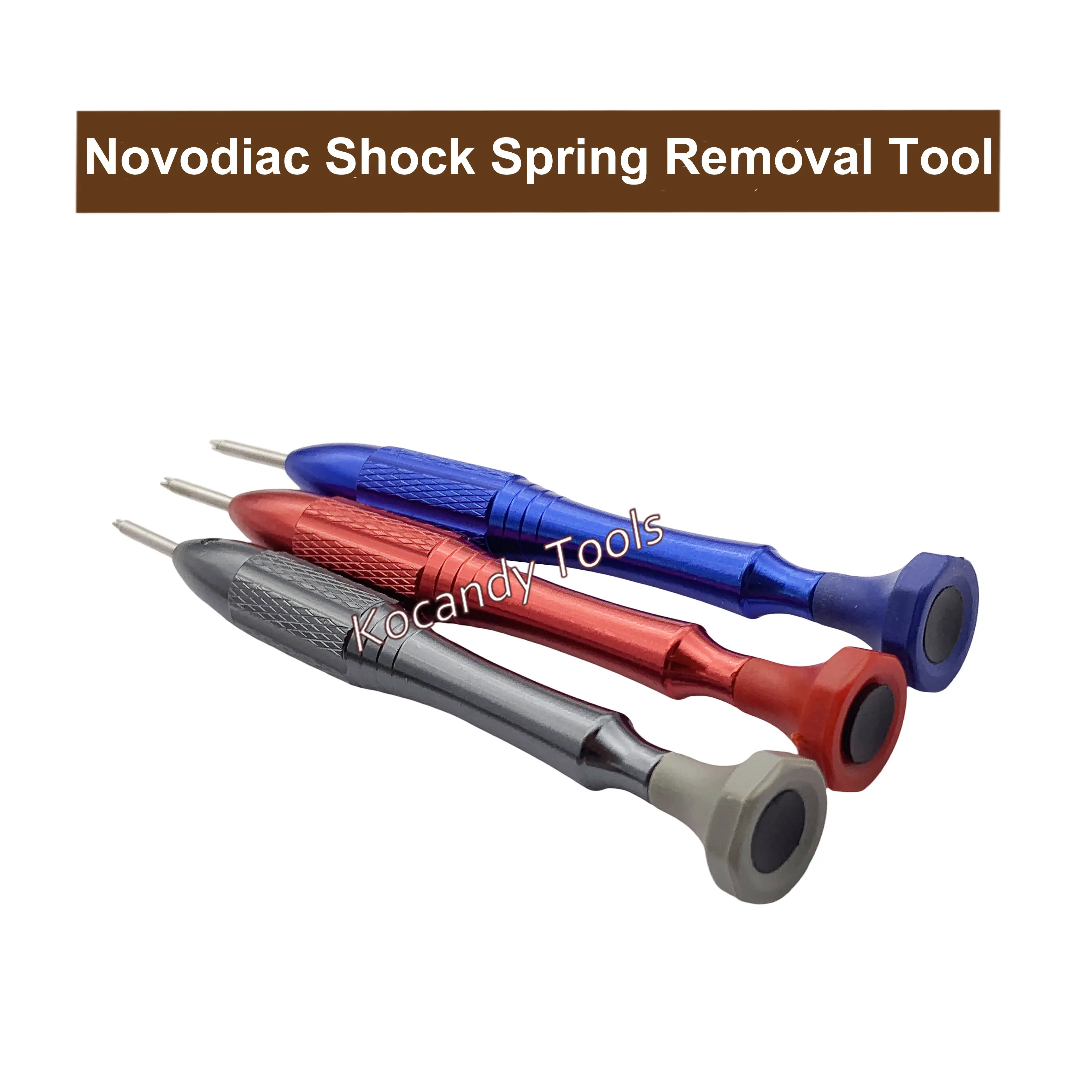Red and blue handled tools with grey shock spring holders laid diagonally