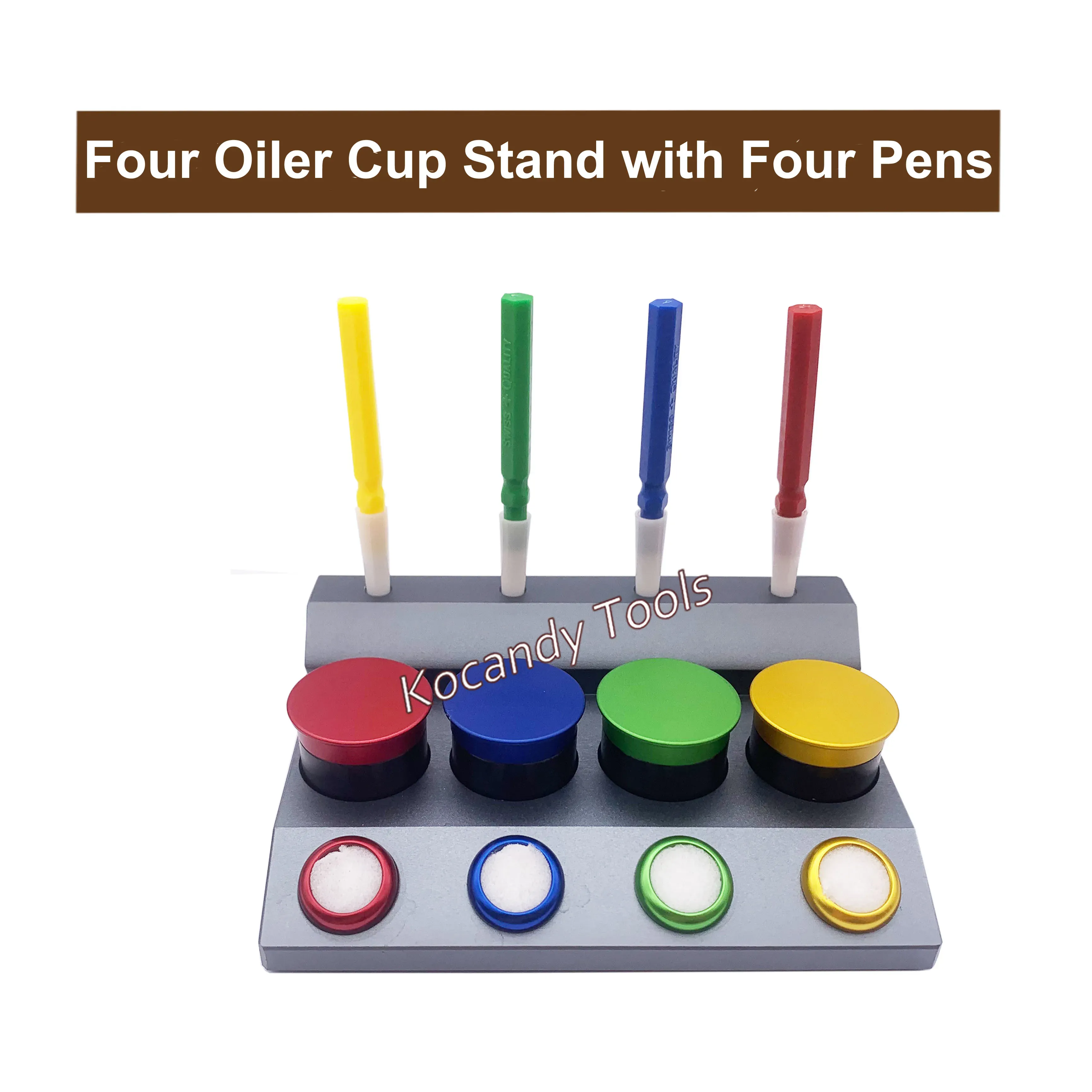 Grey four-cup oil stand with three dip pens behind it