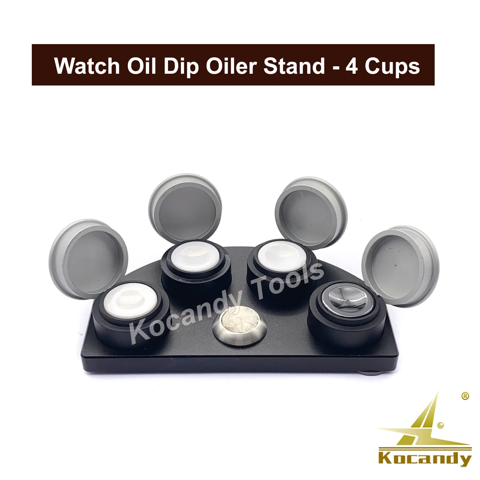 Black die-cast oiler stand holding four white oil dishes with three lids off