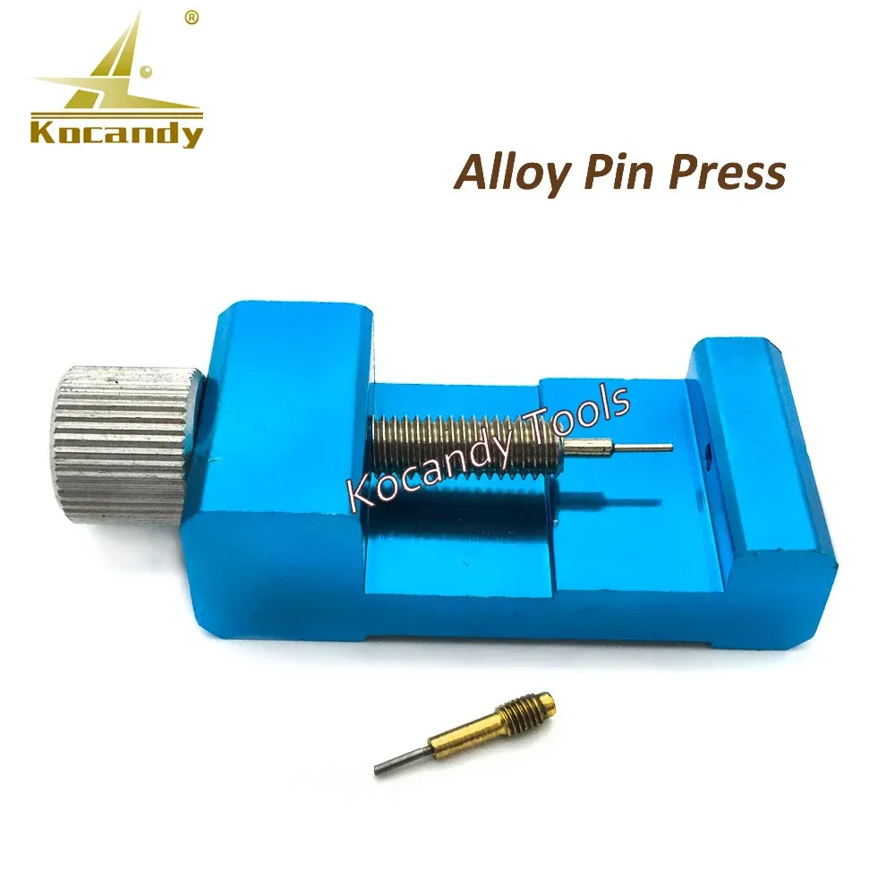 Blue alloy strap pin press tool with a gold link pin beside it
