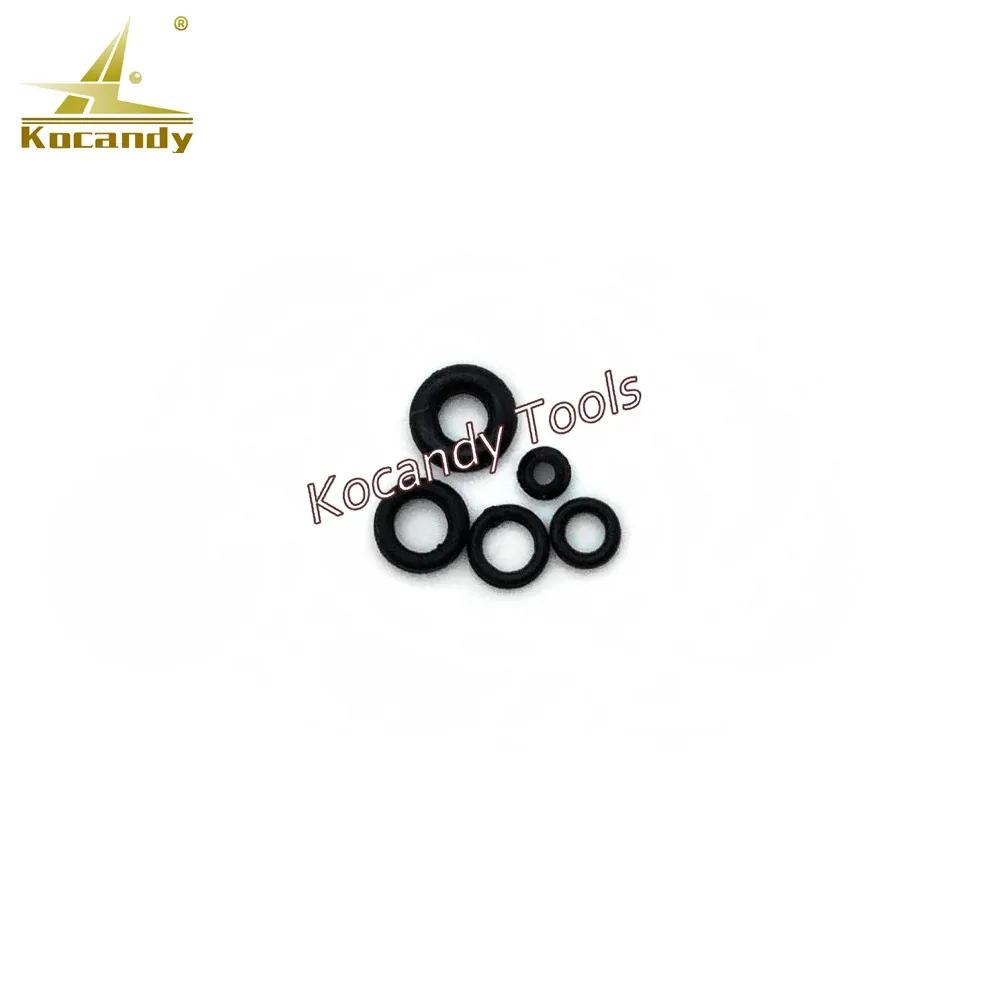 Small cluster of black watch crown O-rings on white