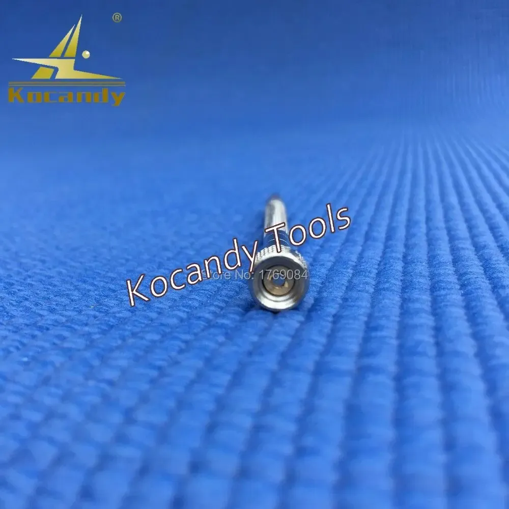 Single double-ended precision screwdriver on a blue textured background