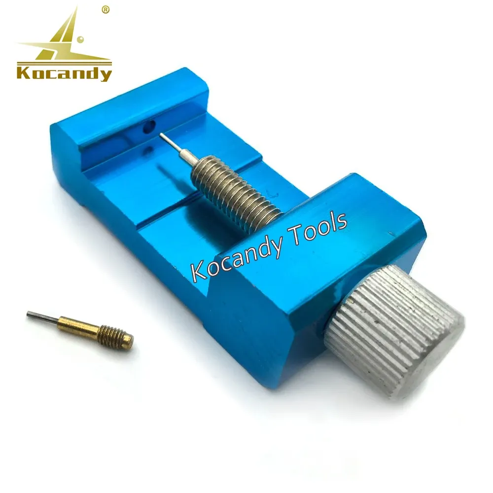 Blue pin press tool viewed at an angle with gold pin and screw knob