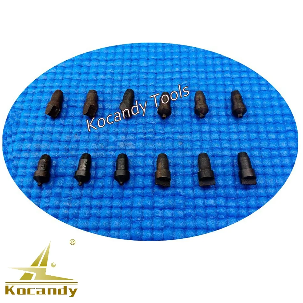 Set of black adjustable case opener dies on a blue surface