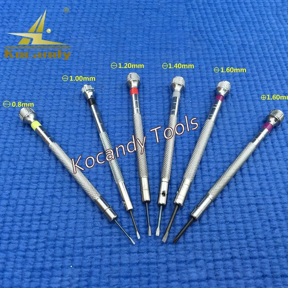 Six screwdrivers fanned evenly on blue, showing their pointed metal tips
