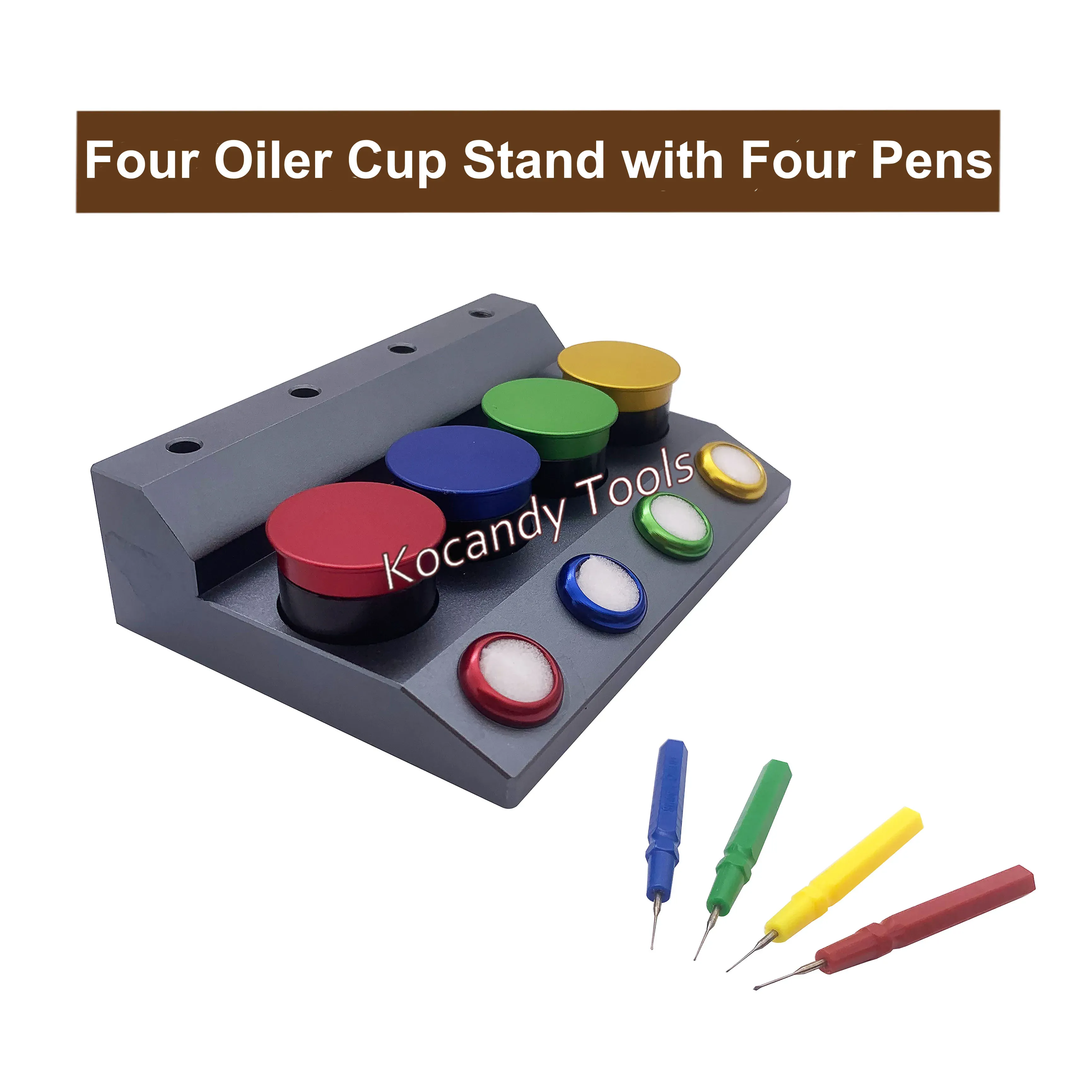 Grey stand with four oil cups and four coloured pens beside it