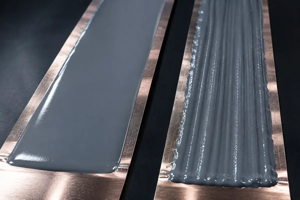 Illustrative side-by-side aqueous electrode coating trial cards recording control formulation, silica candidate, filter pressure and streak observations