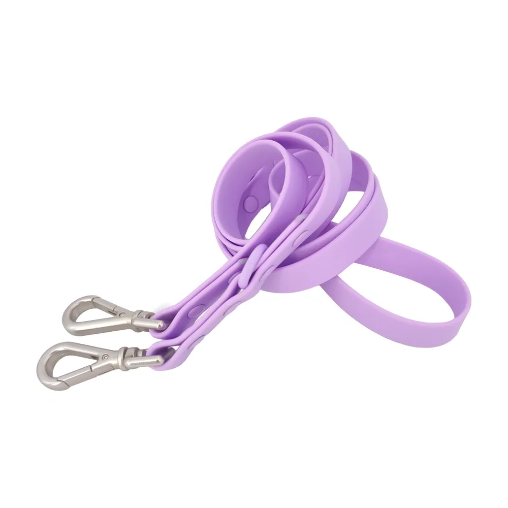 Purple PVC-coated hands-free dog leash with double-ended snap hooks and multiple attachment rings.