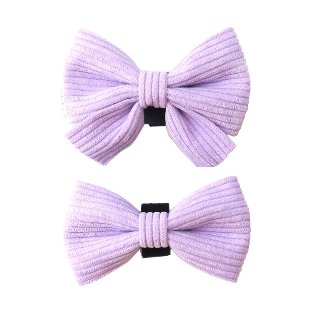 Two lilac woven corduroy pet bow ties in classic and long-tail styles with black collar attachment loops