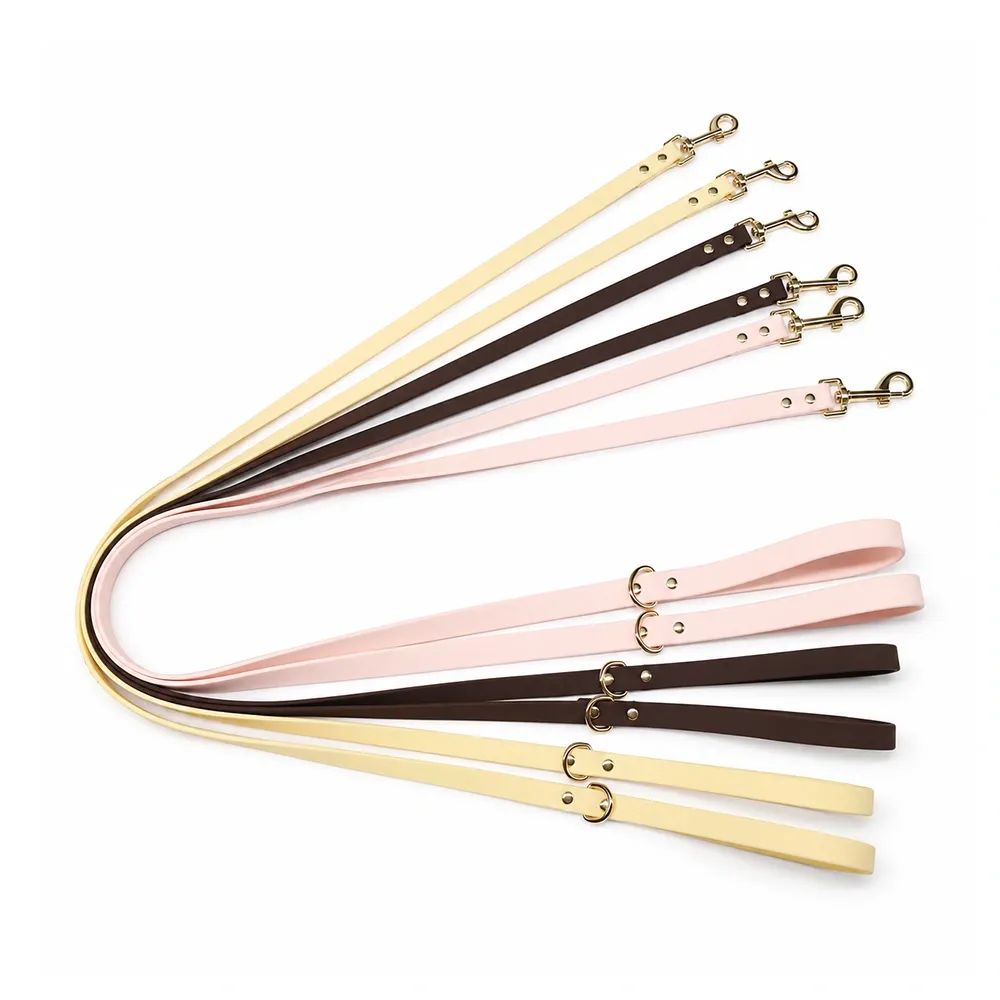 PVC strap dog leashes in beige brown and pink with gold-plated hardware