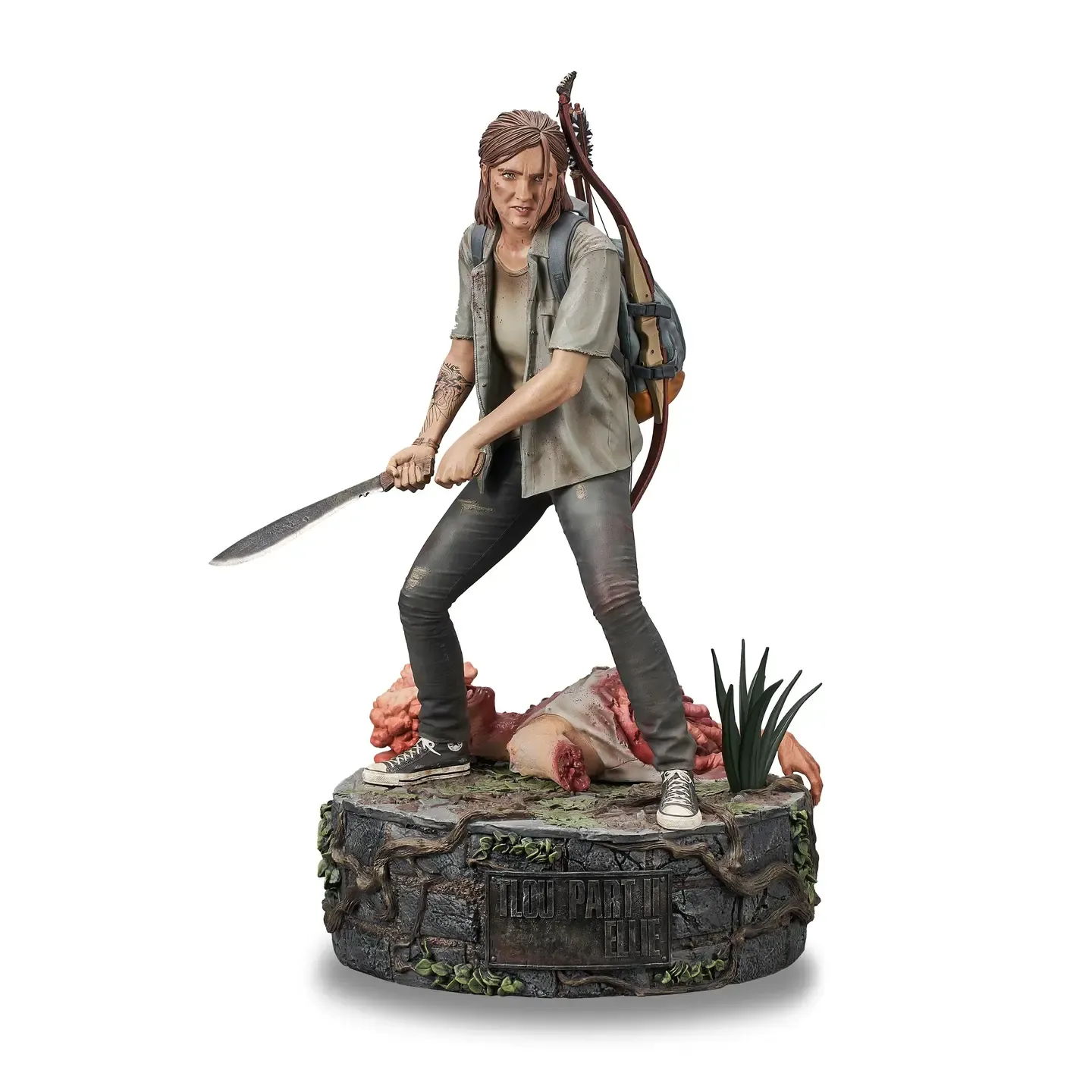 Painted collectible statue with a projecting blade, backpack accessories and a scenic display base on a clean white background