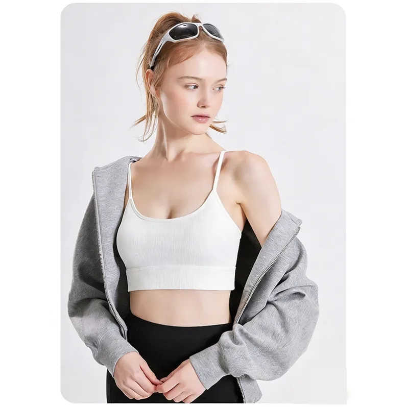 White ribbed yoga camisole 25002 styled under a lightweight jacket
