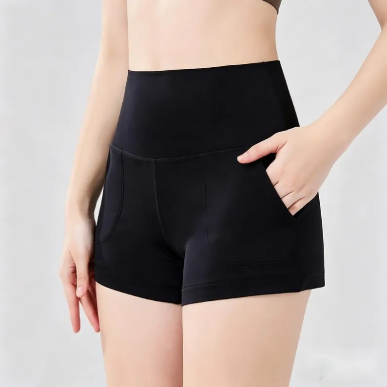Front pocket view of black women's high-waisted yoga shorts 25041