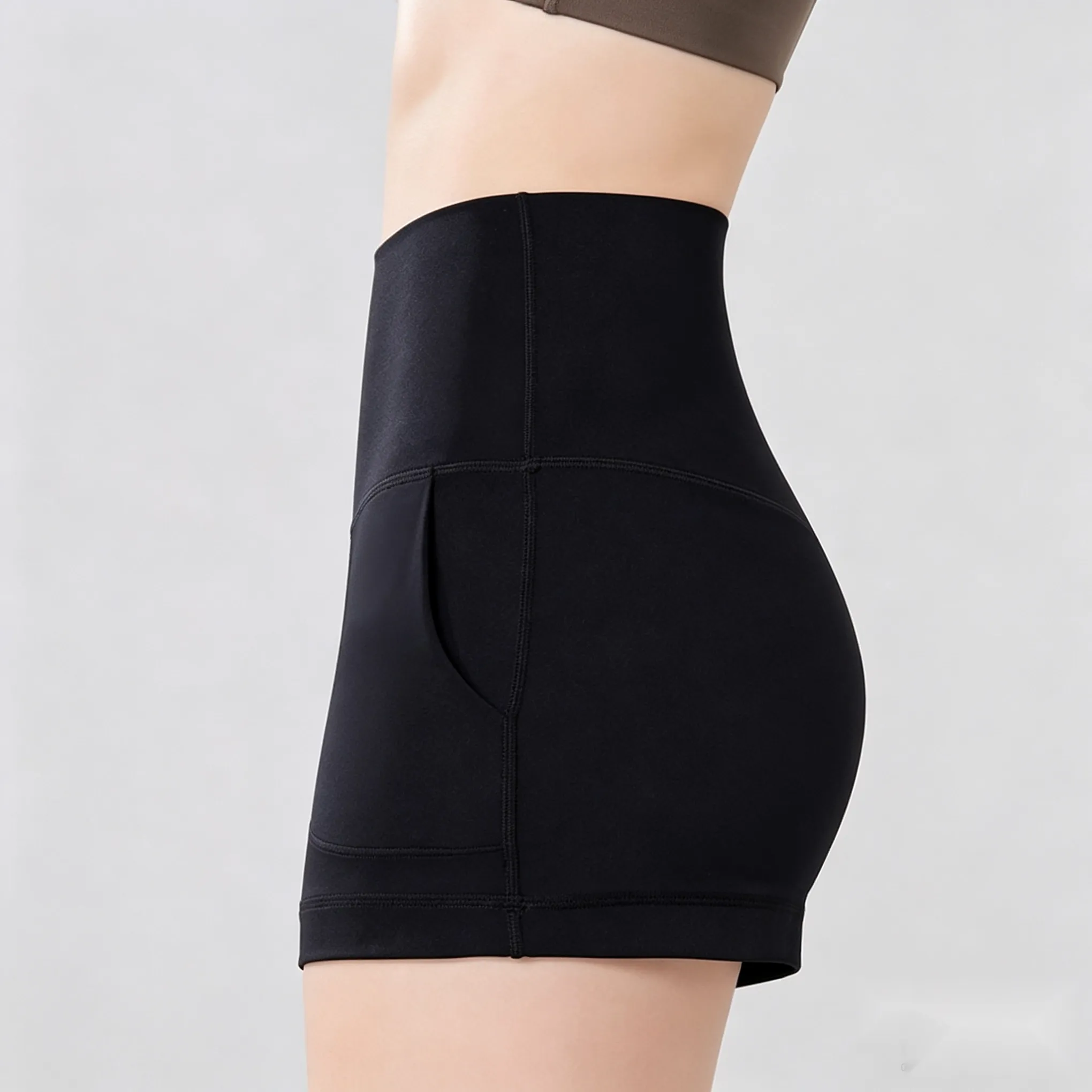 Side pocket and high-rise waistband detail of GENY YOGA 25041 shorts