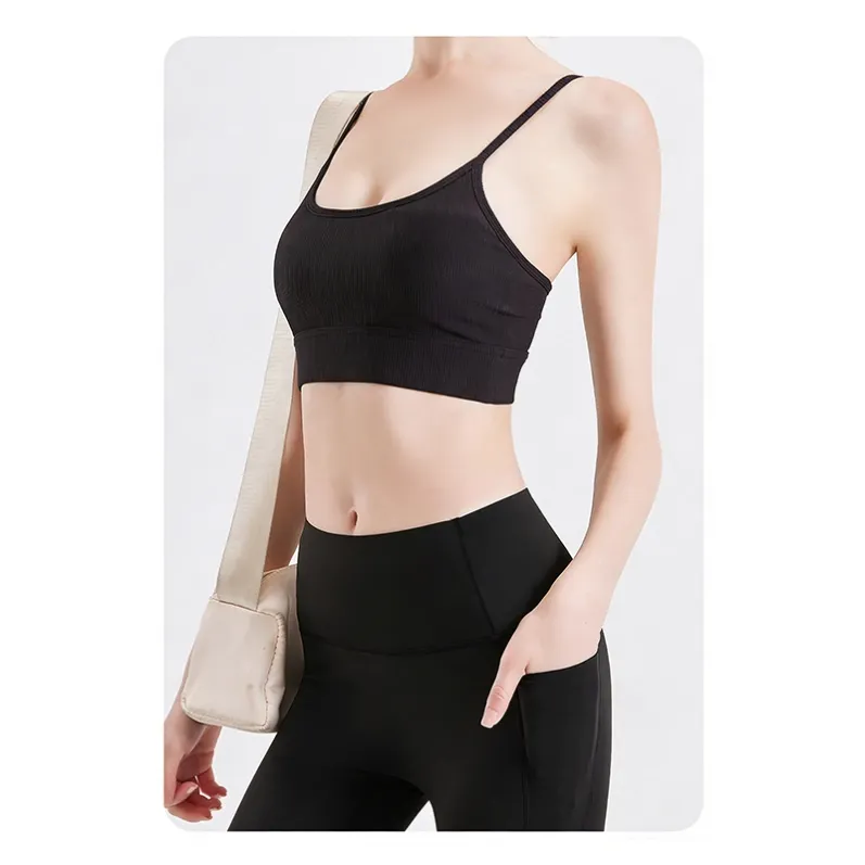 Front view of black ribbed yoga camisole with slim straps and built-in cups