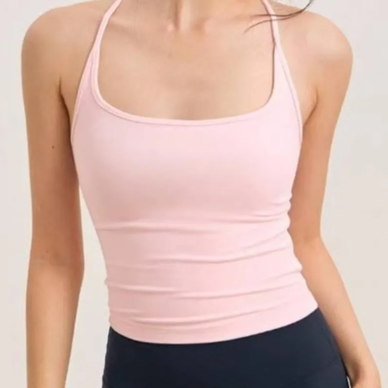 Front view of pink fitted yoga tank with built-in fixed cups