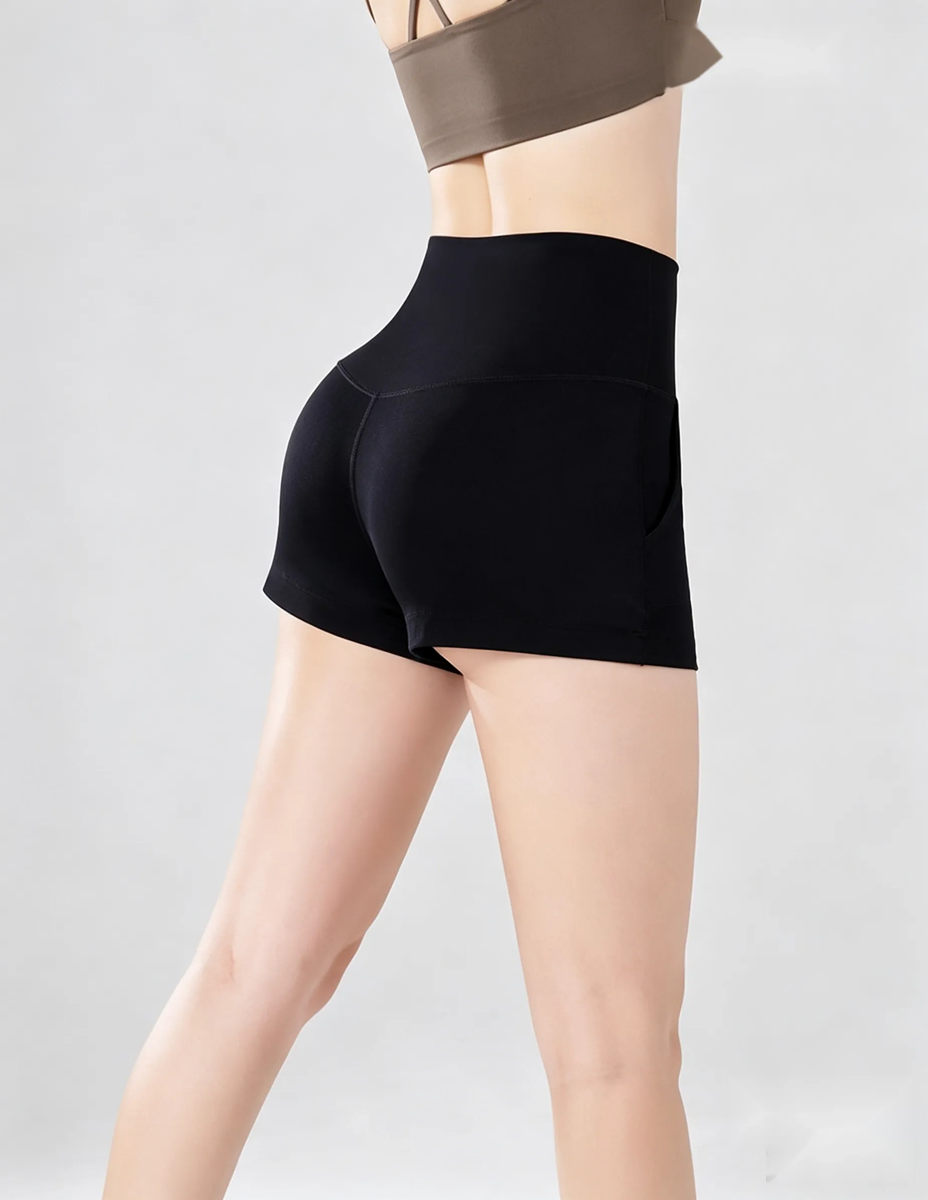 Rear fit of black women's sculpting yoga shorts 25041