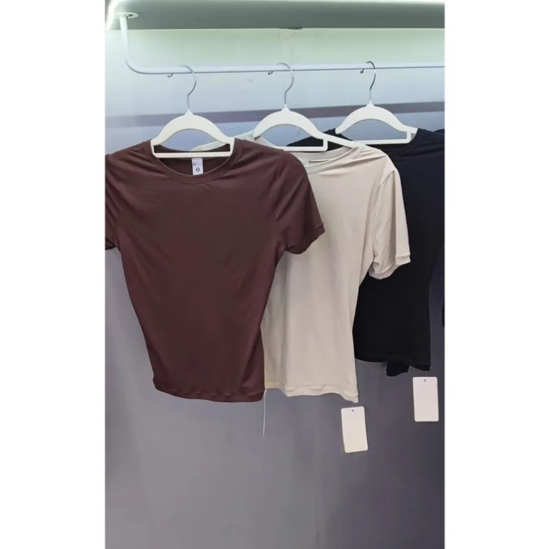 Neutral-color bodywear samples on hangers for GENY YOGA private-label collection review