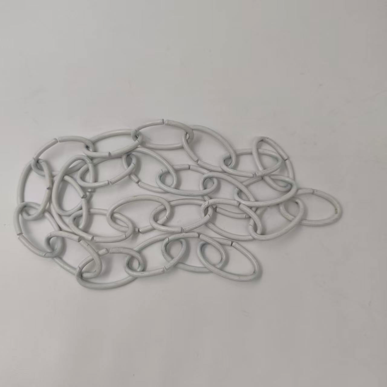 white decorative oval chain