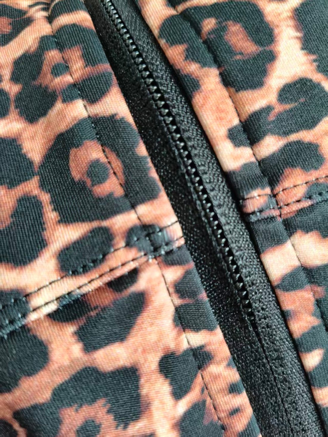 Leopard print jacket seam and stitch detail - Miss K