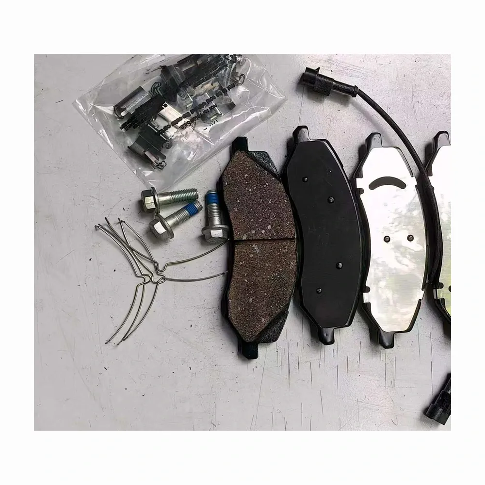 Brake pad set with mounting bolts, wire clips and fittings