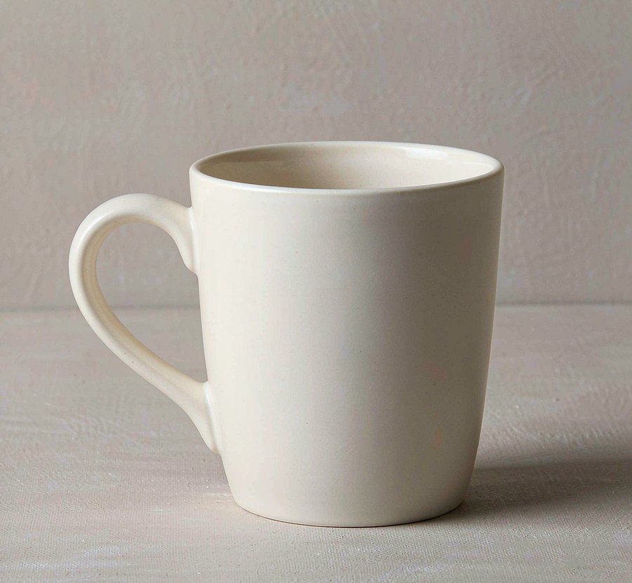 Cream ceramic mug with C-handle