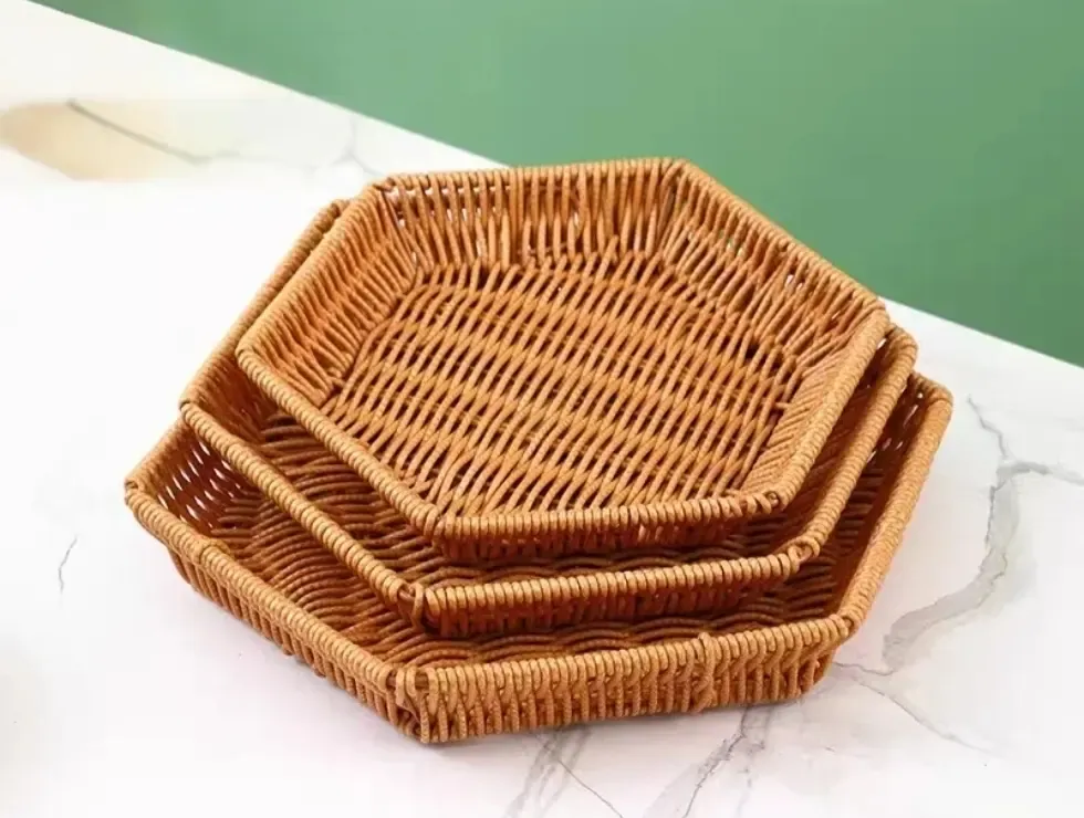 Set of three nested octagonal woven trays with reinforced rims