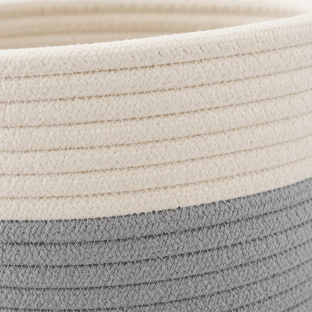 Handwoven cotton rope basket with detailed woven construction