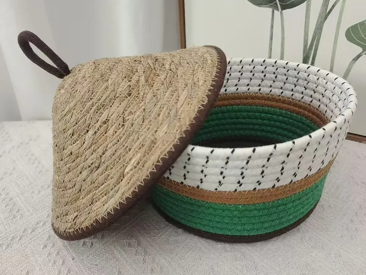 Cotton rope storage basket with a seagrass lid and leather pull loop