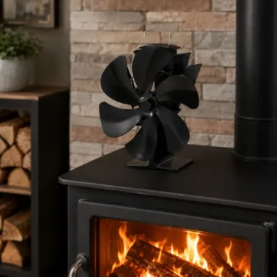 Heat powered stove fan on wood stove