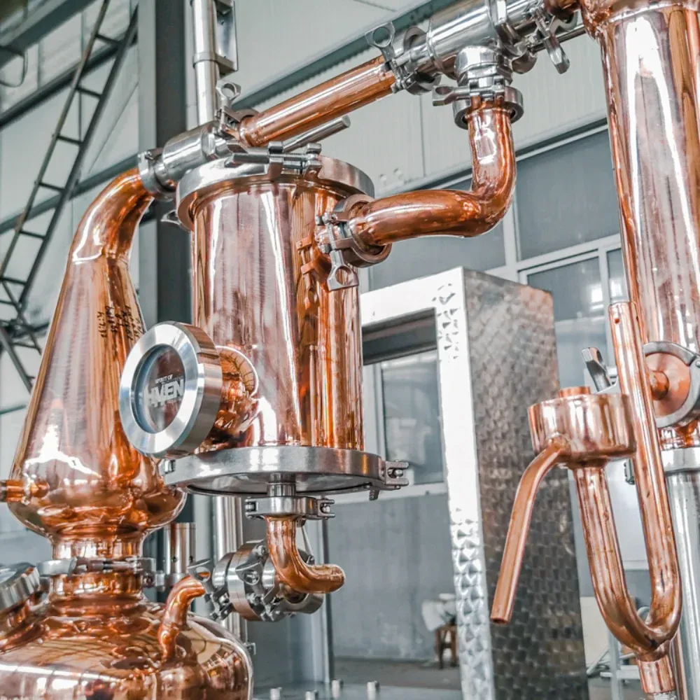 Detailed view of swan neck and copper joints on 20L gin still