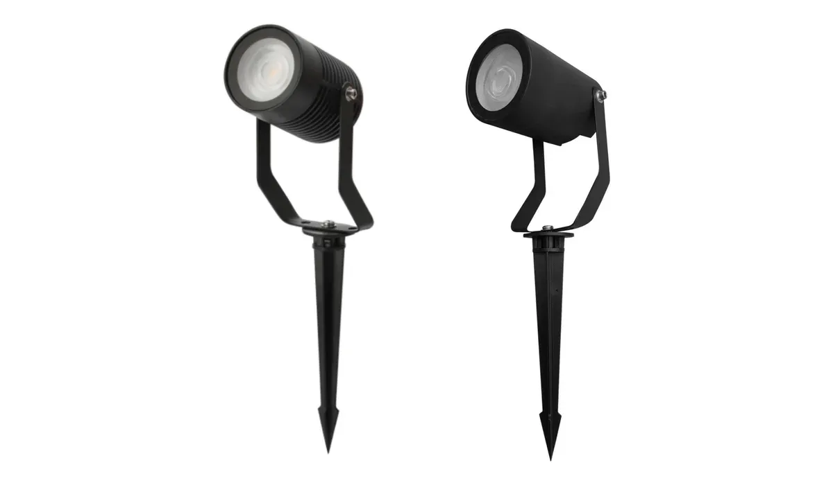 Two black outdoor LED spike lights with adjustable brackets and ground spikes, manufactured in our Foshan factory