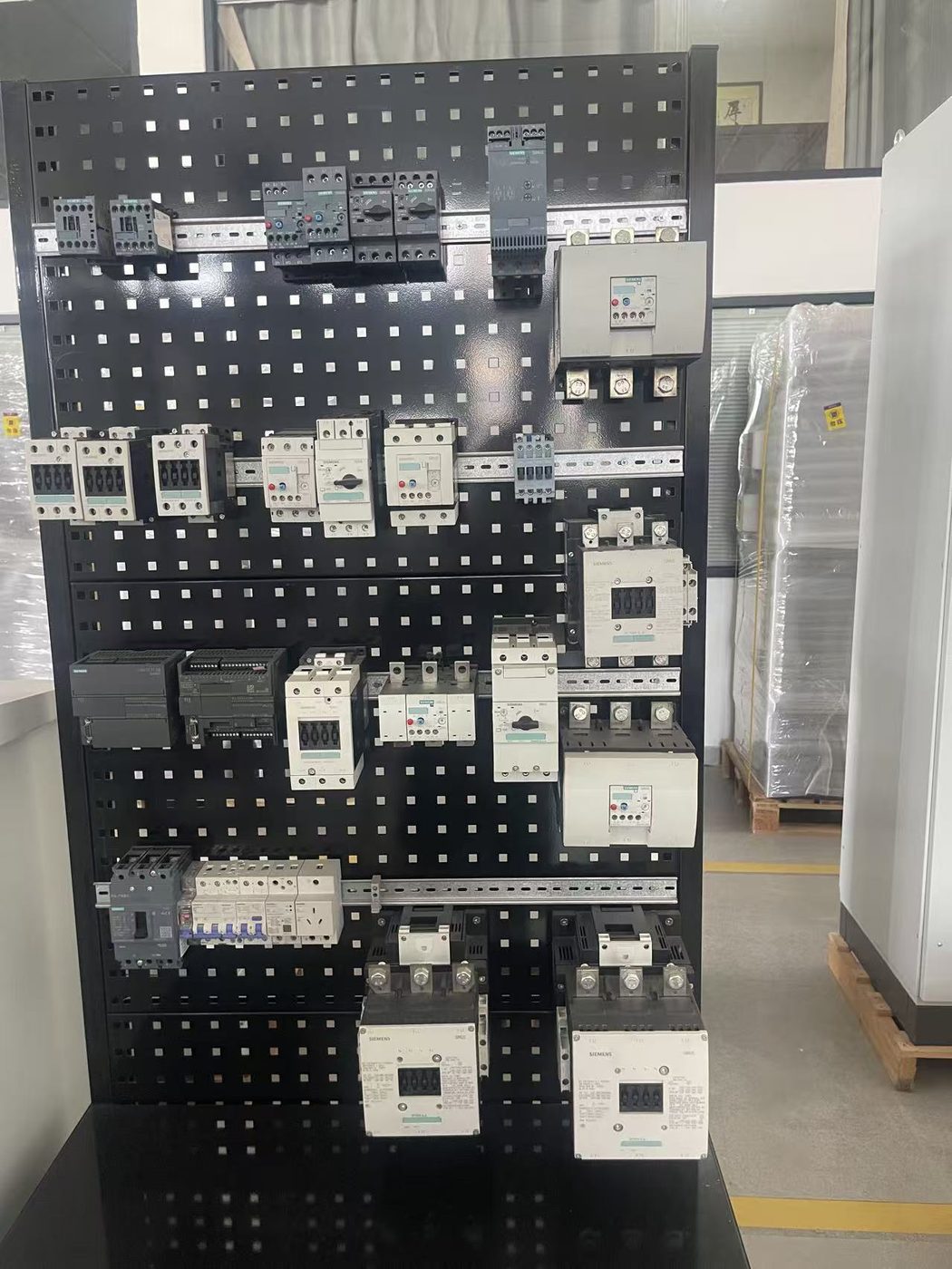 Component mounting plate laid out for a custom control cabinet