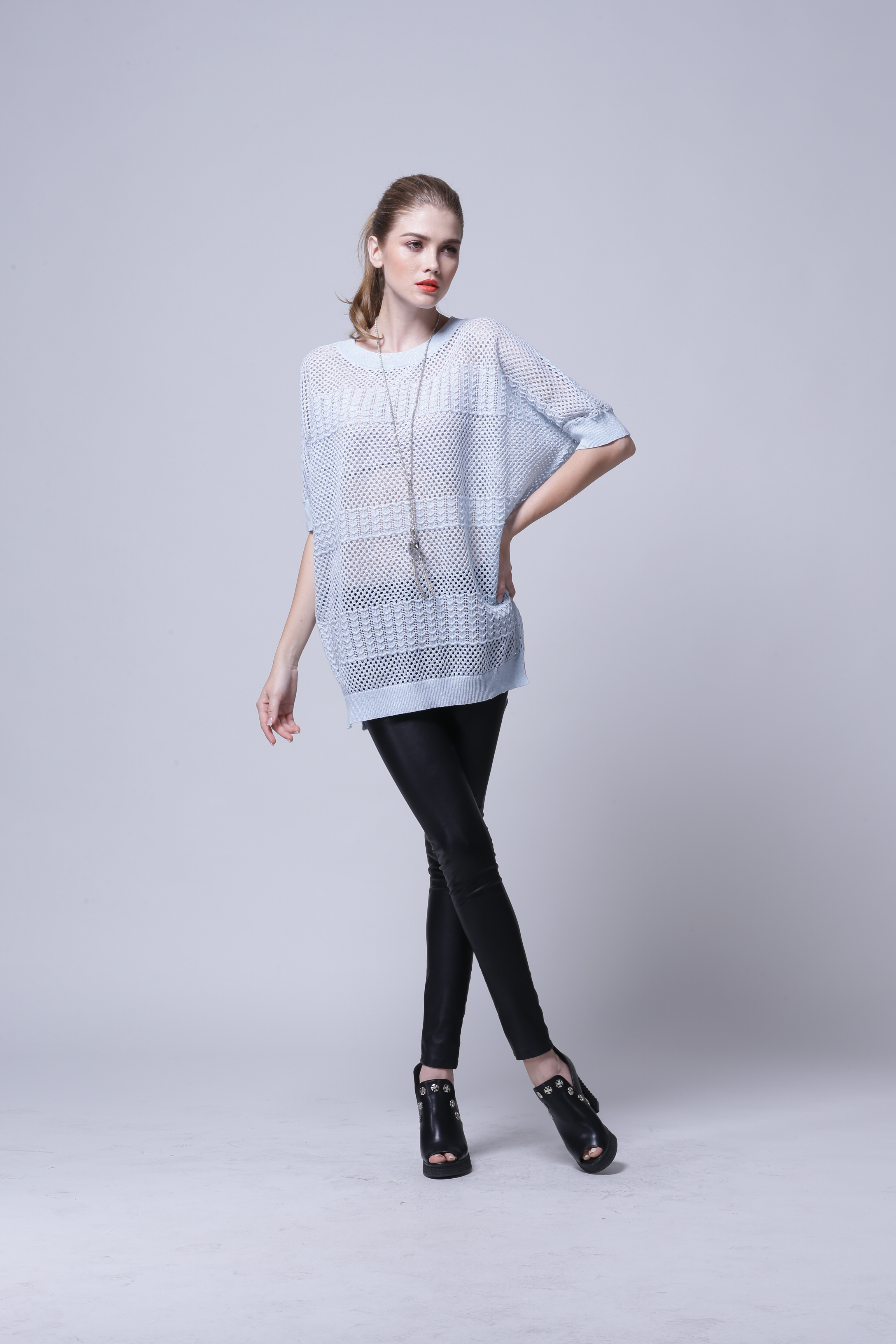 Side silhouette presentation of women's knitted pullover IMP112